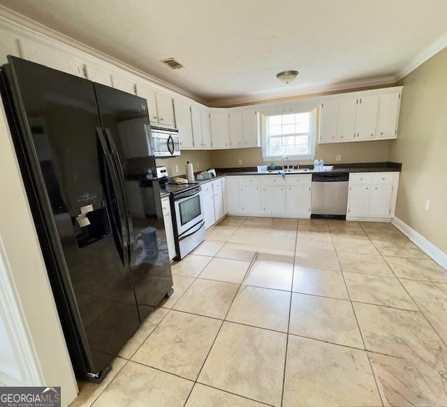 utility room featuring water heater