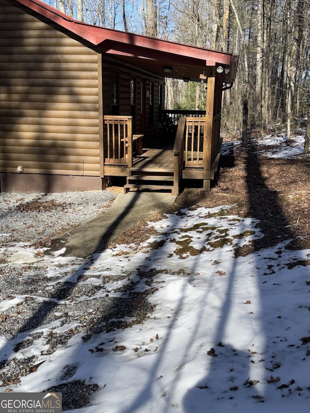 view of snow covered deck