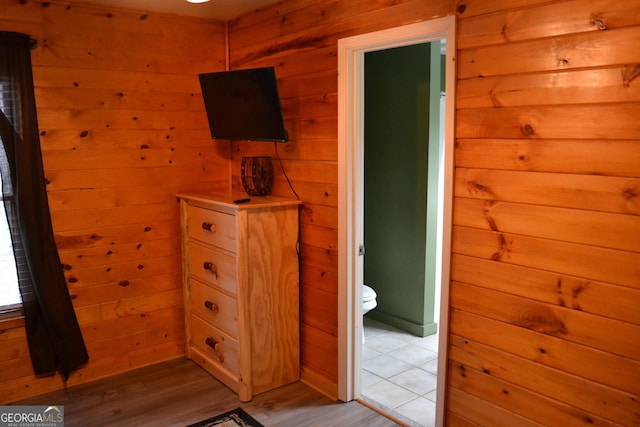 interior space featuring toilet and hardwood / wood-style floors