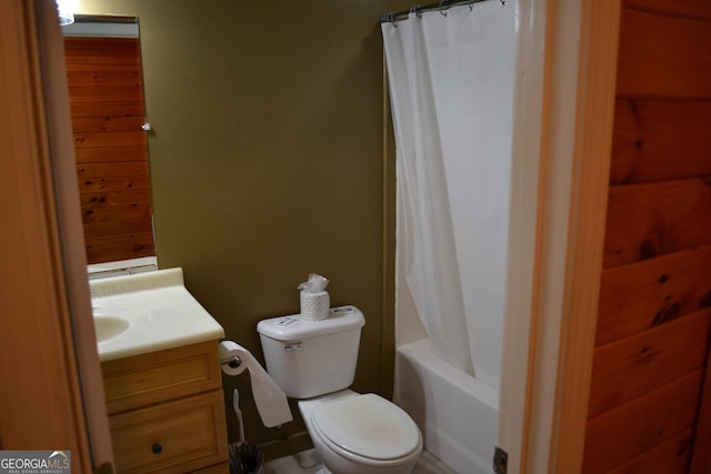 full bathroom featuring vanity, toilet, and shower / bathtub combination with curtain