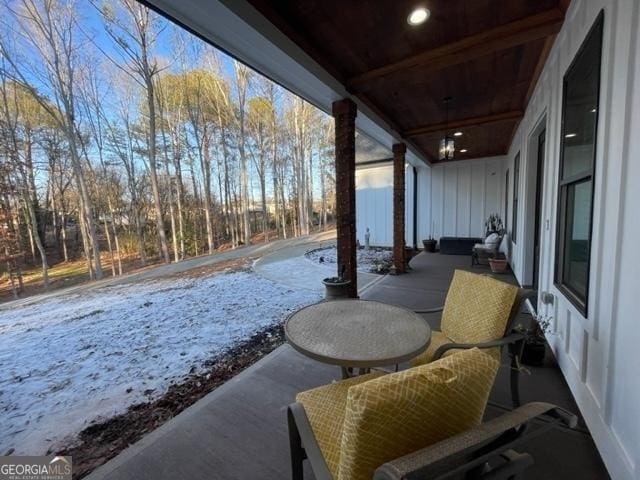 view of snow covered patio