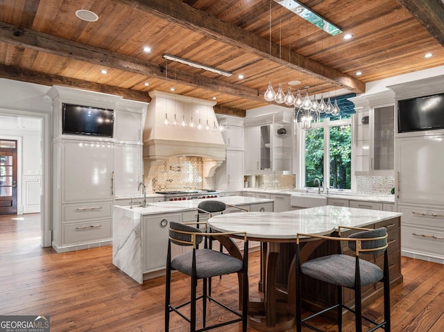 4345 Mount Paran Pkwy NW, Atlanta, GA 30327 - kitchen featuring a large island, wooden ceiling, custom exhaust hood, hardwood / wood-style floors, and beamed ceiling