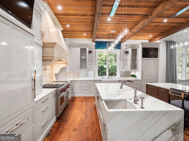 4345 Mount Paran Pkwy NW, Atlanta, GA 30327 - kitchen with range with two ovens, wooden ceiling, a sink, an island with sink, and wood-type flooring