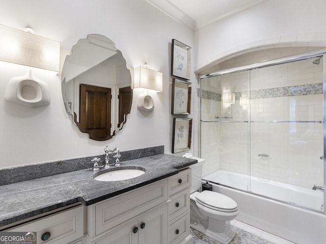 4345 Mount Paran Pkwy NW, Atlanta, GA 30327 - bathroom with ornamental molding, toilet, vanity, and combined bath / shower with glass door
