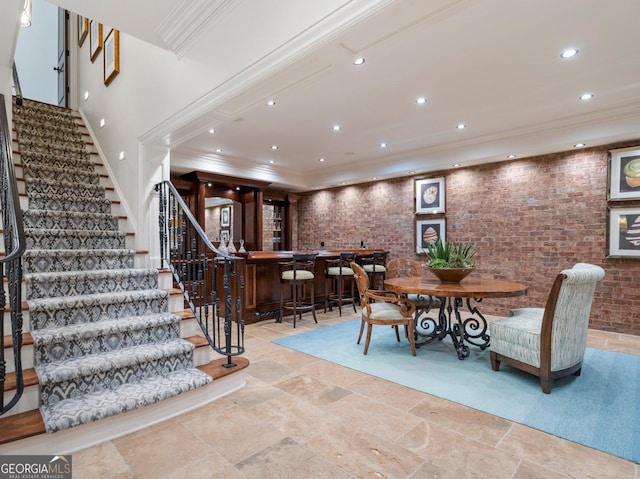4345 Mount Paran Pkwy NW, Atlanta, GA 30327 - dining space featuring stairs, stone tile floors, bar area, crown molding, and recessed lighting
