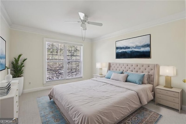 carpeted bedroom featuring crown molding, baseboards, and ceiling fan