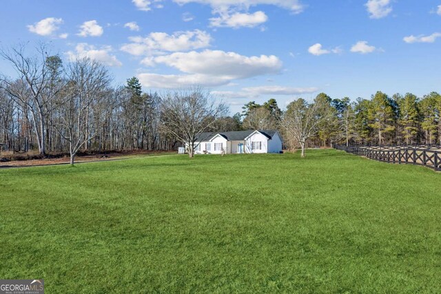 view of front of home featuring a front lawn