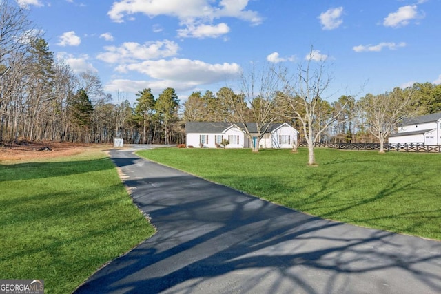 view of front of home with a front lawn