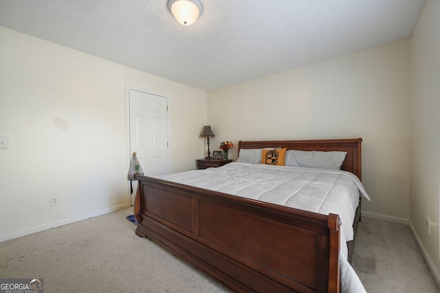 bedroom with light carpet