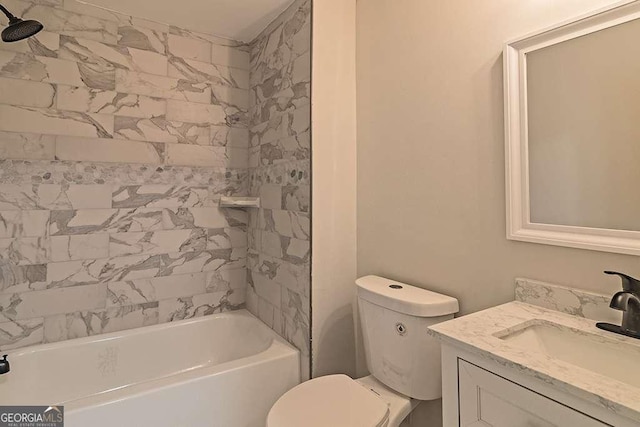 full bathroom with toilet, vanity, and tiled shower / bath combo