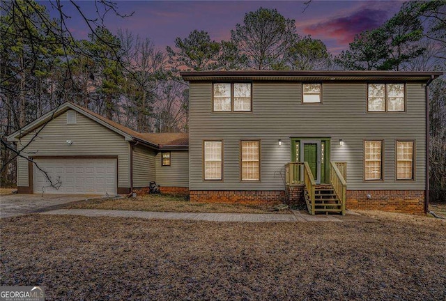 view of front of home with a garage