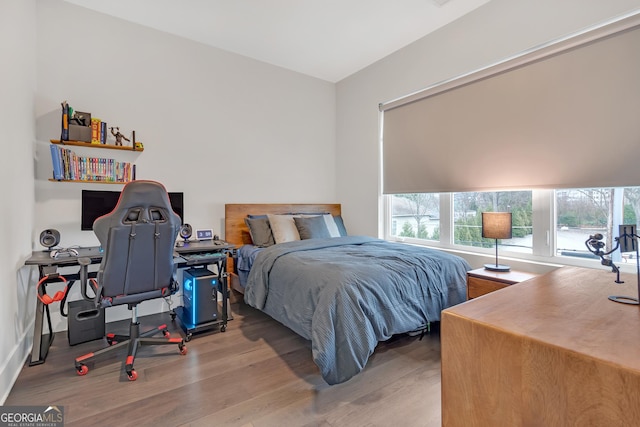 bedroom featuring light hardwood / wood-style floors