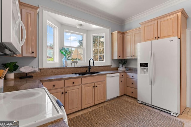 kitchen with light tile patterned floors, light brown cabinets, white appliances, crown molding, and sink