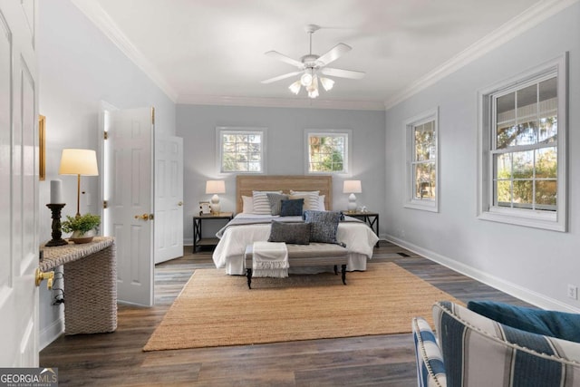 bedroom with dark wood-type flooring, ceiling fan, and ornamental molding