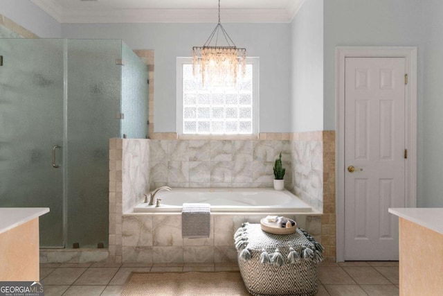 bathroom with crown molding, tile patterned floors, separate shower and tub, and a notable chandelier