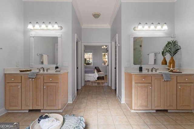 bathroom featuring ornamental molding, tile patterned flooring, and vanity