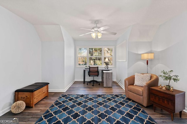 home office featuring vaulted ceiling, ceiling fan, and dark hardwood / wood-style floors