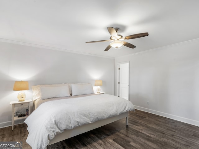 bedroom with ceiling fan, dark hardwood / wood-style floors, and ornamental molding