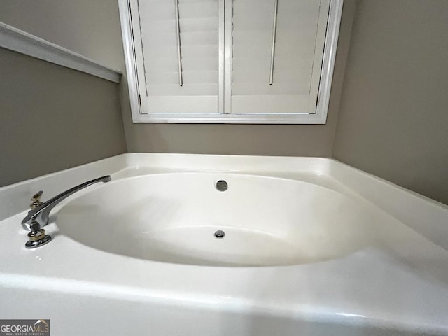 bathroom with a bathing tub