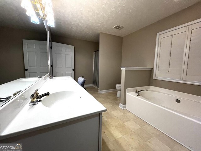 kitchen featuring light stone countertops, light hardwood / wood-style flooring, black electric cooktop, and a center island