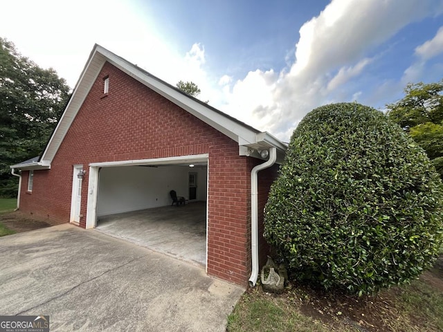 view of property exterior featuring a garage