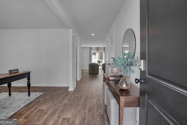 entrance foyer with dark hardwood / wood-style floors