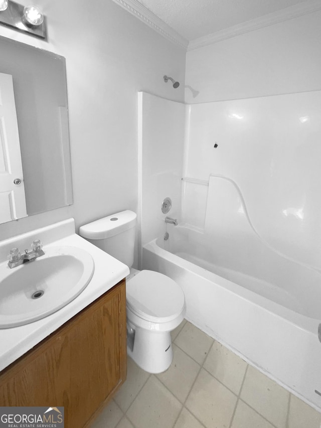 full bathroom featuring toilet, shower / washtub combination, tile patterned flooring, crown molding, and vanity