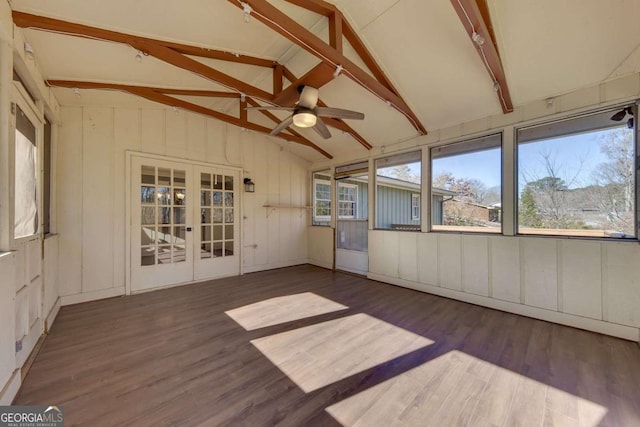 unfurnished sunroom with ceiling fan, french doors, and lofted ceiling with beams