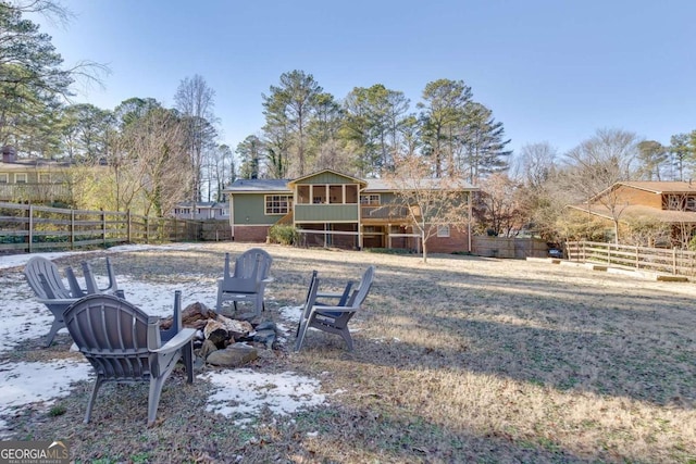 view of yard featuring a sunroom