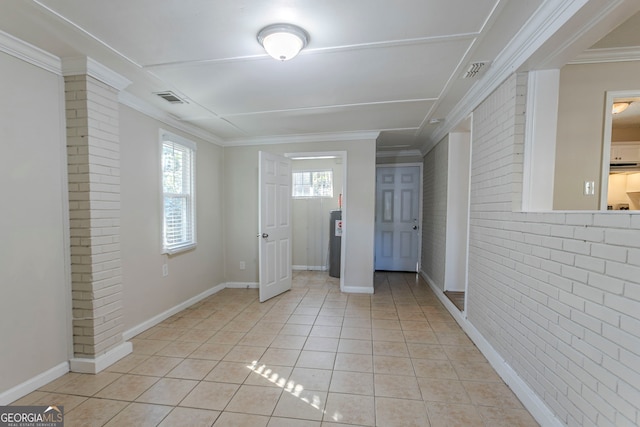 1883 La Mesa Ln, Decatur, GA 30032 - interior space featuring light tile patterned floors, ornamental molding, and brick wall