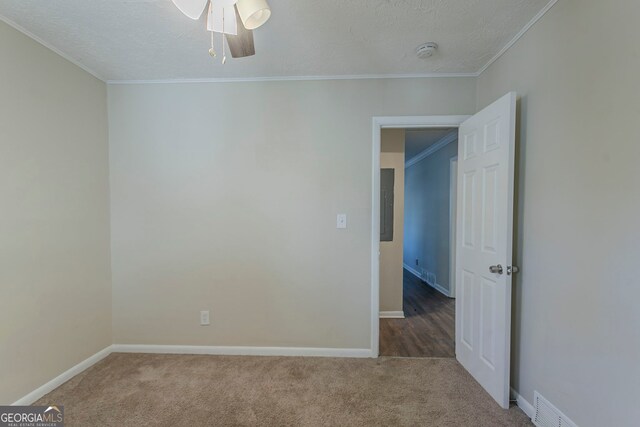 1883 La Mesa Ln, Decatur, GA 30032 - carpeted spare room featuring crown molding, ceiling fan, and a textured ceiling