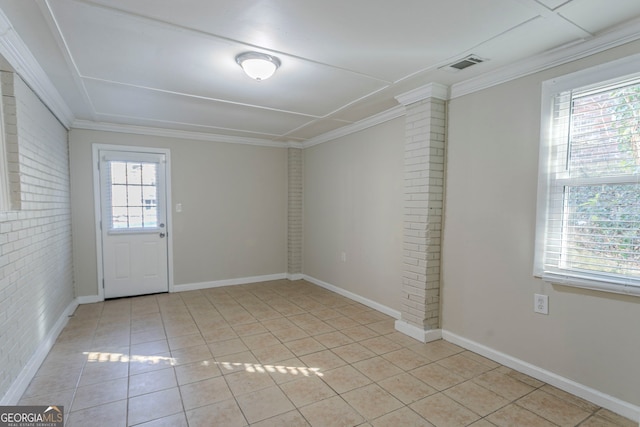1883 La Mesa Ln, Decatur, GA 30032 - tiled empty room with crown molding and brick wall