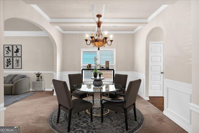 unfurnished living room featuring beamed ceiling, dark wood-type flooring, and ceiling fan