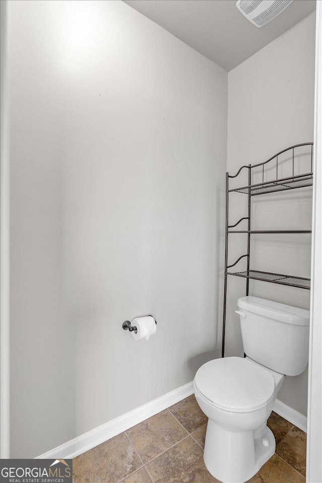 full bathroom featuring shower / bathtub combination, vanity, and toilet