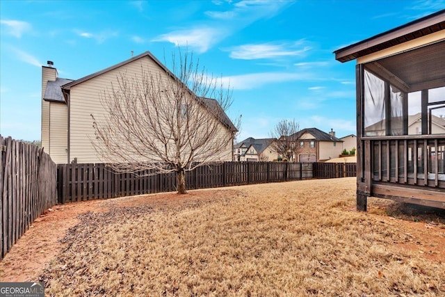 view of side of property with ceiling fan