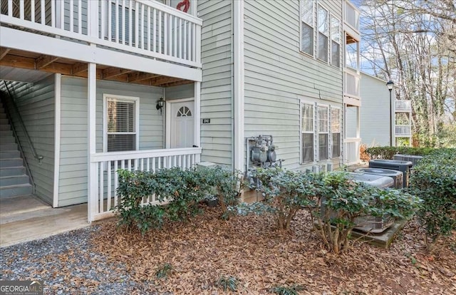 entrance to property with a balcony