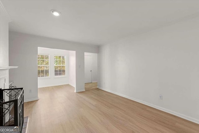 unfurnished living room featuring light hardwood / wood-style floors