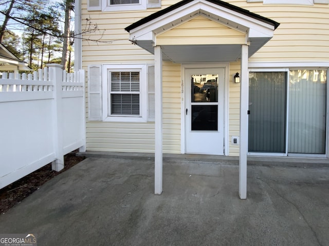 entrance to property with a patio area