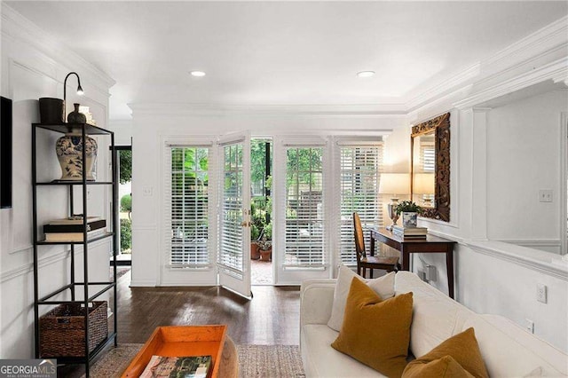 doorway to outside featuring dark hardwood / wood-style floors and ornamental molding