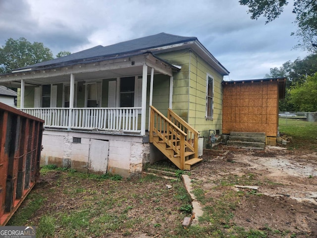 1777 Yellow St NW, Conyers, GA 30012 - view of side of property with covered porch