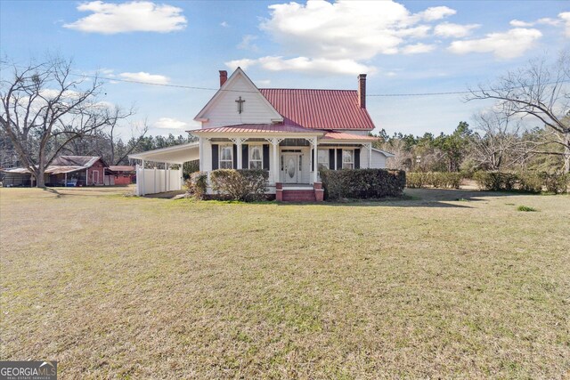 view of front of house featuring a front lawn and a porch