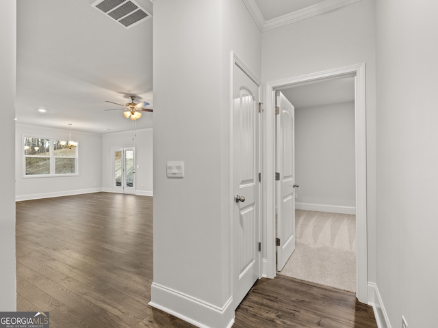 42 Parkview Dr, Dallas, GA 30157 - corridor with dark hardwood / wood-style floors, crown molding, and a notable chandelier