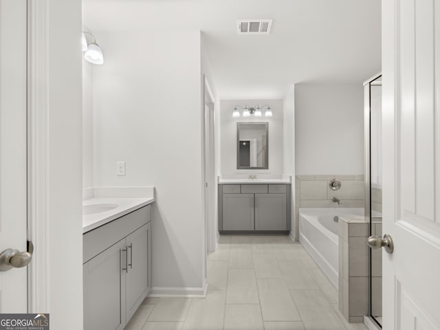 42 Parkview Dr, Dallas, GA 30157 - bathroom featuring vanity, tile patterned flooring, and a bathing tub