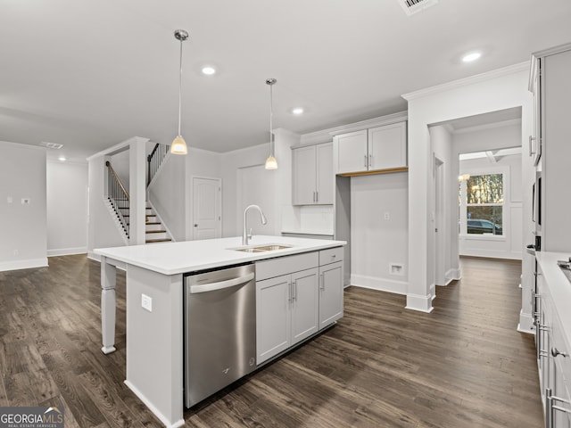 42 Parkview Dr, Dallas, GA 30157 - kitchen featuring pendant lighting, dark hardwood / wood-style flooring, an island with sink, sink, and stainless steel dishwasher