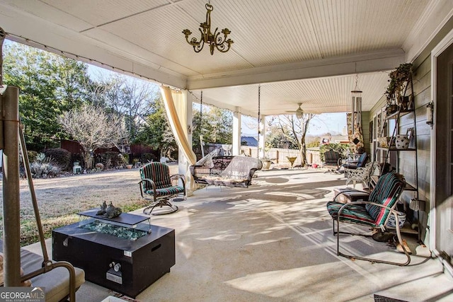 view of patio / terrace with an outdoor fire pit