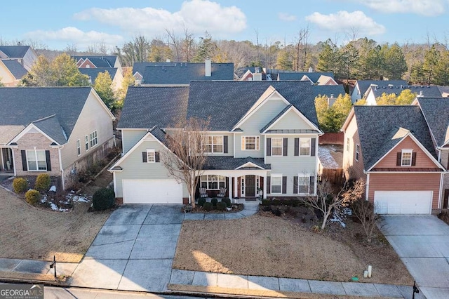 front of property with a garage