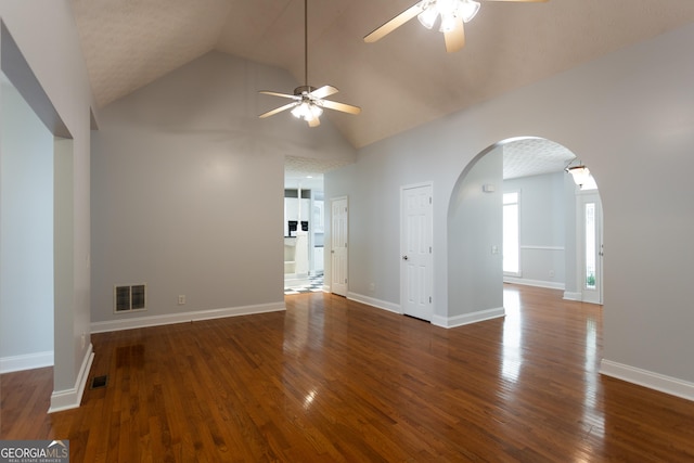 interior space featuring ceiling fan, dark hardwood / wood-style flooring, and high vaulted ceiling