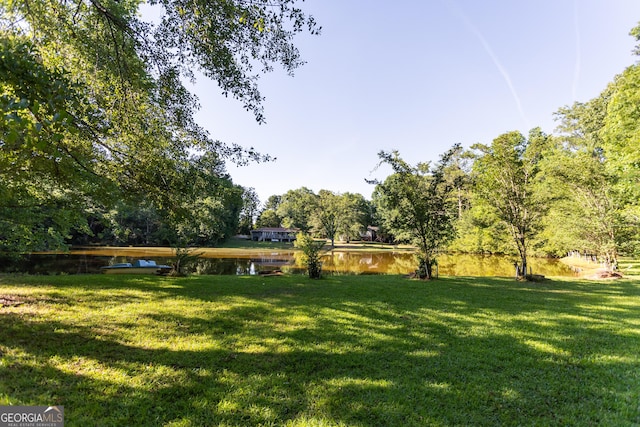 view of yard with a water view