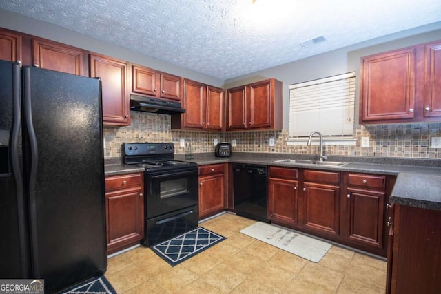 kitchen featuring sink, a textured ceiling, black appliances, and tasteful backsplash