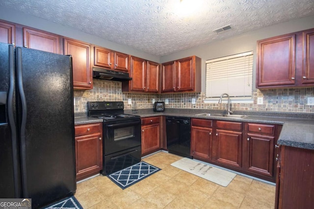 kitchen with black appliances, backsplash, sink, and a textured ceiling